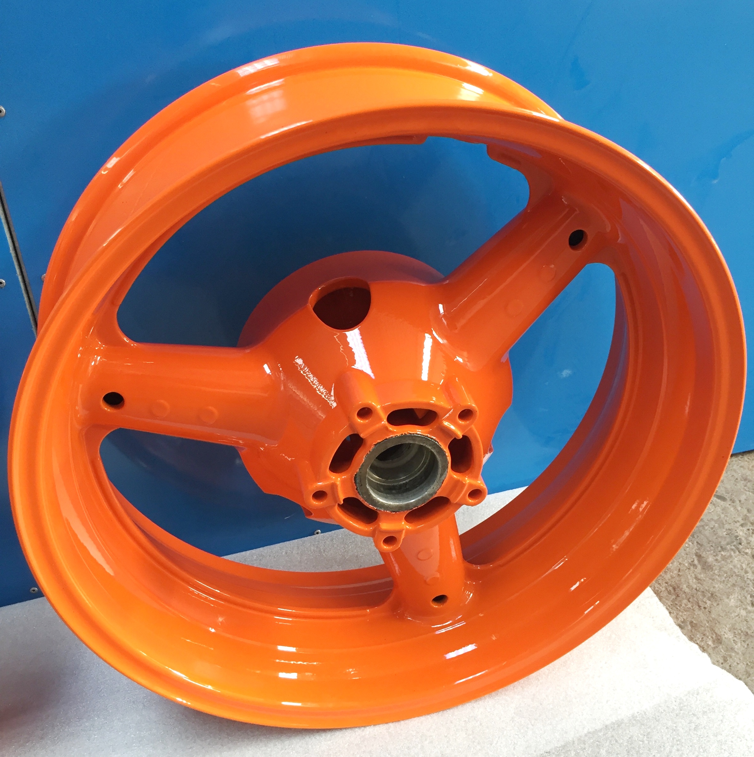 Orange Coated Wheel Metal — Power Coating and Sandblasting Grafton, NSW